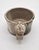 A one-of-a-kind matched pair of hand-thrown, wide-mouth stoneware mugs, each topped with its own sculpted face medallion...