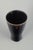Rörstrand Vase, mid-20th century. Tall, conical stoneware vase with a dark glaze featuring subtle vertical streaks that...