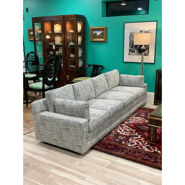 This is one cool cat. Epic renovation just back from the upholstery masters and wrapped in the most sophisticated Boucle...