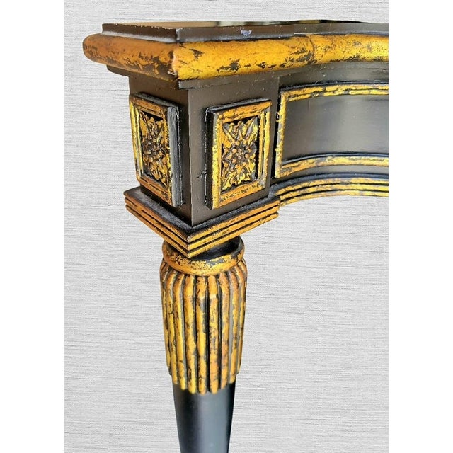 ​Elevate your entryway, foyer, or living space with this striking vintage Empire Regency console table. Featuring a...