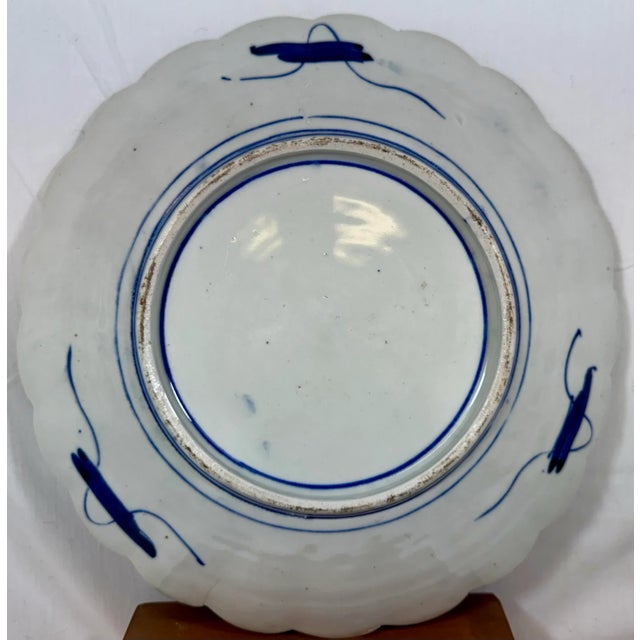 Large Antique Scalloped Edge Porcelain Imari Plate Decorated With Rich Colored Floral & Landscape Scenes From Japan - Circa 1880 For Sale - Image 10 of 11