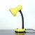 Playful and functional desk lamp by Rendi, model Baby 2. Featuring a vibrant yellow lacquered metal shade and base paired...