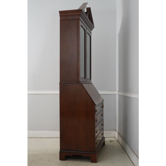 Age: Approx: 30 Years Old Details: Glass Adjustable Shelves Beveled Glass Bracket Feet Dovetailed Drawer Construction...