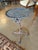 Footprint measurements on floor: Height - 19.75” x width at feet 15”. Diameter at top of table is 12.25”. Brutalist style...