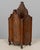 A 19th century French fariniere made of walnut with nicely detailed hand-carved decorative motifs: fishes on front panel,...