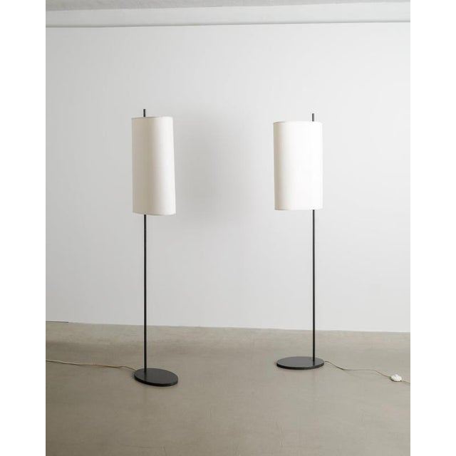 A rare pair of danish mid century "aj royal" floor lamps in dark grey lacquered metal with white fabric shades by arne...