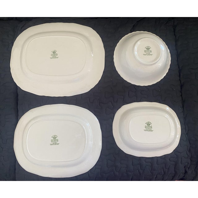 4-piece servingware set featuring the iconic "Fruit Basket" pattern by Mason's Ironstone, a staple of English transferware...