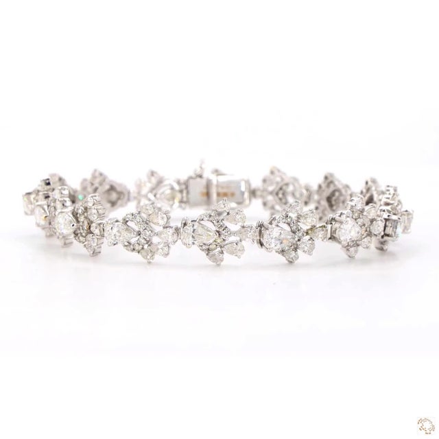 This bracelet from our contemporary estate collection centers on a 6.35-carat diamond in a round brilliant cut for lively,...