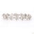This bracelet from our contemporary estate collection centers on a 6.35-carat diamond in a round brilliant cut for lively,...