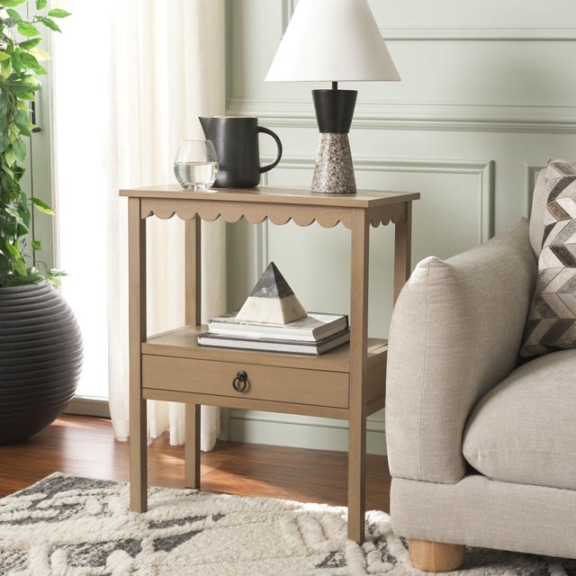 Bring understated elegance to your home with the Haven Low Drawer Accent Table in a warm desert brown finish. This...