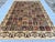This exquisite hand-knotted wool area rug features a classic Bakhtiari garden design. The main field is divided into an...
