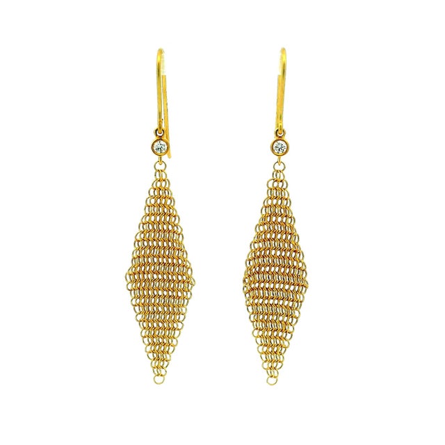 A refined and recognizable design by Elsa Peretti for Tiffany & Co., these elegant drop earrings are crafted in 18 karat...