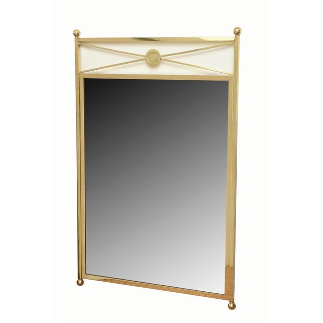 This vintage very modernist designed mirror with a French Billy Haines influence has elegance and simplicity with it's...