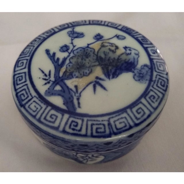Acquired while on a two week trip in mainland China in 1983. Hand painted in small bird and bamboo foliage motif....