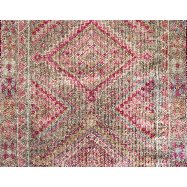 A stunning Mid-20th Century Turkish Konya runner with a simple all-over diamond pattern woven in the most wonderful color...