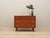 The chest of drawers was made in the 1970s in Denmark. The structure is covered with teak veneer. The legs are made of...