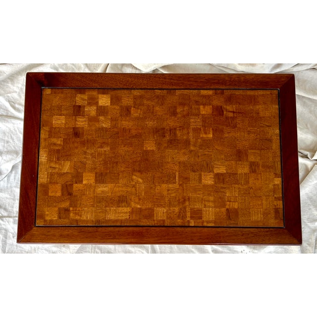 An Henredon asian style walnut side table. Solid walnut legs and sides with interior checkerboard veneered top. Ming style...