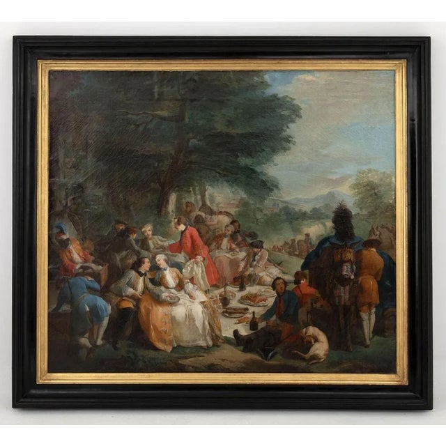 After Carle Van Loo, La halte de chasse (1737) (in English « The hunting halt »). Large oil on canvas with a black...