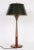 3' H Gerald Thurston for Lightolier flared and incised brass and walnut table lamp, circa 1960. Featuring a radiating...
