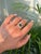 This striking 1.01 carat emerald-cut emerald and diamond contemporary bypass ring is crafted in 18K two-tone gold,...