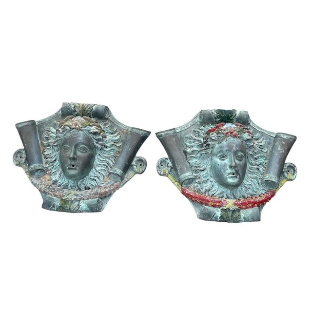 Elevate your outdoor architectural elements or grand interior focal points with this rare, striking pair of vintage...
