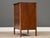 A mid century modern walnut four drawer dresser chest or oversized nightstand with aluminum drawer pulls designed by Paul...