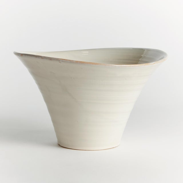 A durable stoneware, this pot is made with an innovative process to be as elegantly thin as porcelain, these intricate...