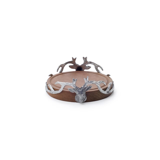 This wood and pewter wine coaster brings rustic, lodge-inspired charm to your dining table, finished with a sculptural...
