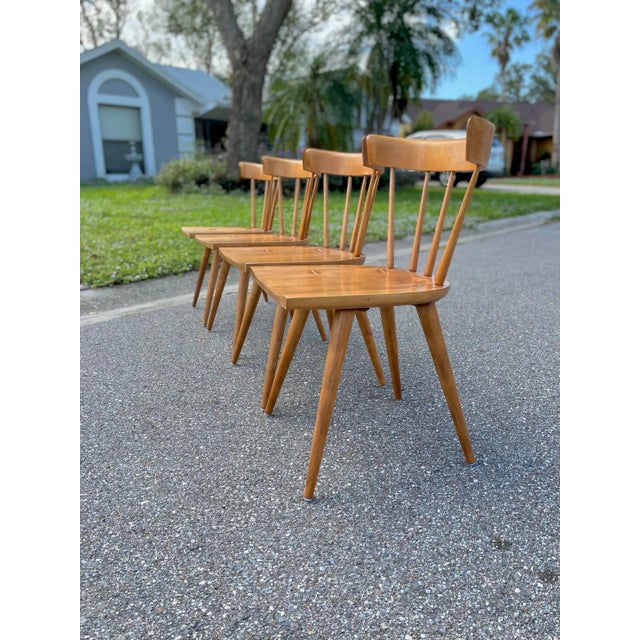 Set of Four Classic Spindle Back Maple Dining Chairs by Paul McCobb for Planner Group. Two Sets of Four are available,...