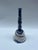 A single vintage art pottery bell with handle featuring a swirled blue and white finish.