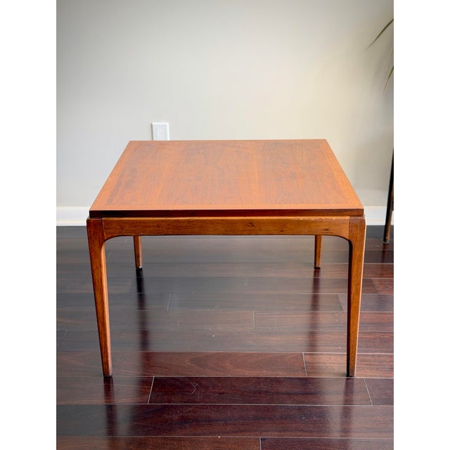 An authentic 1963 Lane Furniture “Rhythm” Collection lamp table, Style No. 997-06, produced in Altavista, Virginia. The...