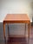 An authentic 1963 Lane Furniture “Rhythm” Collection lamp table, Style No. 997-06, produced in Altavista, Virginia. The...