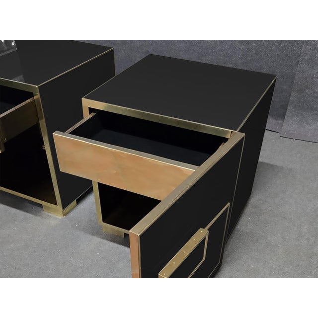 This Black Murano Glass & Brass nightstands are an extraordinary fusion of Italian artistry and modern design. Expertly...