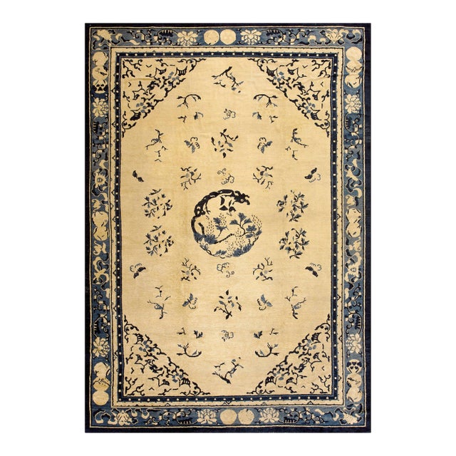 A Beige Field Adorned With Blue Floral Sprays and Central Medallion Antique Chinese Peking Rugug For Sale