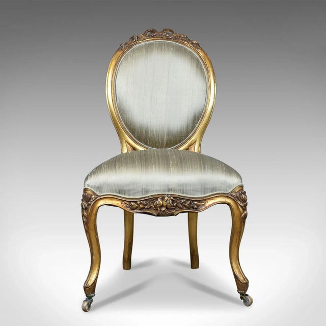 This is a vintage 20th century salon chair in the antique French taste, giltwood dating to circa 1970. Attractive and...