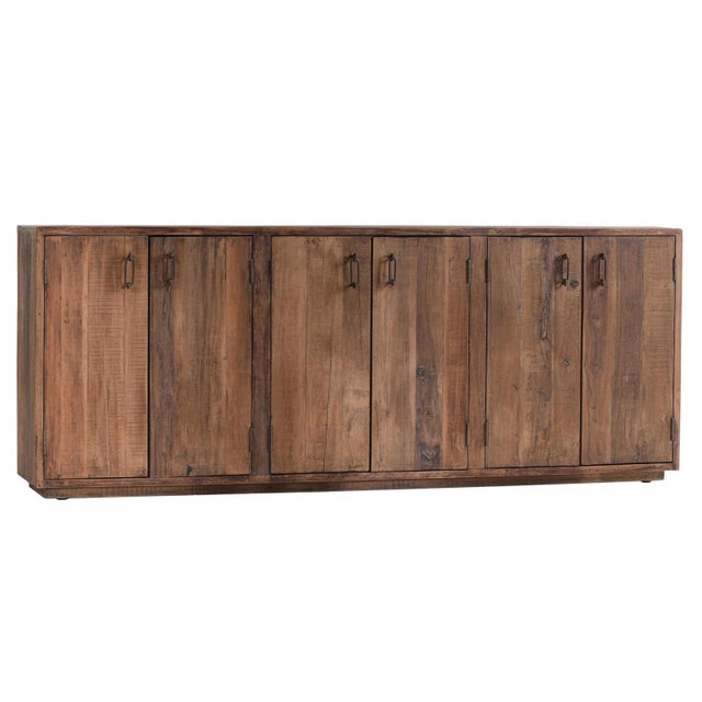 Rustic modern salvaged solid wood sideboard / credenza. Six doors with aged iron pulls. Each cabinet will vary in wood...