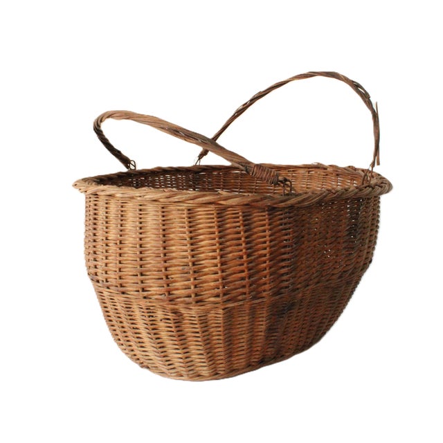 Once used in a European farmhouse. Large 19th Century French handwoven basket with original swing handles. Height...