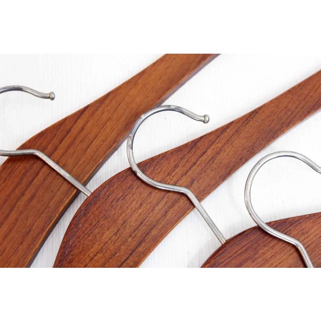 Set of 4 Scandinavian teak hangers This set of 4 teak hangers will look great in an entrance hall, a bedroom or even a...