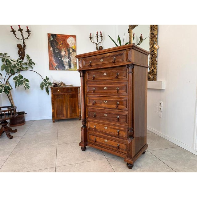 Restored Gründerzeit (late 19th-century) 7-drawer chest of drawers, walnut veneer. Dimensions: Height x Width x Depth to...