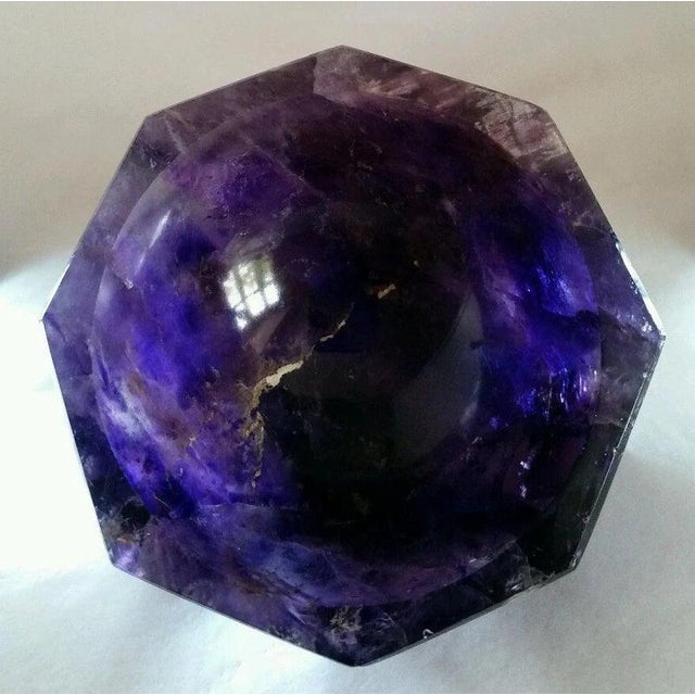 A striking decorative bowl carved from amethyst, the violet variety of quartz prized for its distinctive colour and...
