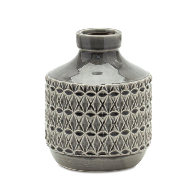Add modern elegance to your space with this 7" Geometric Terracotta Vase. Crafted from durable clay and finished in a...