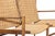 Two-seater sofa is a design furniture item realized by Artist of the mid-20th century. A vintage sofa realized in teak and...