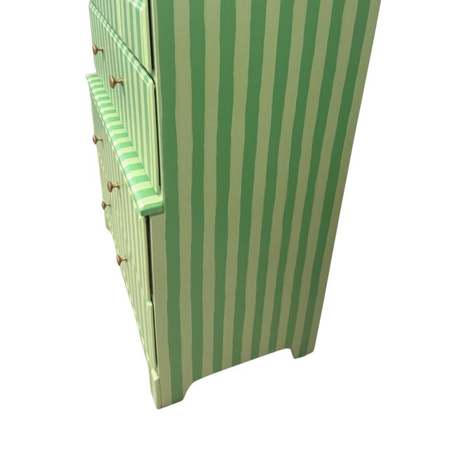 A sculptural vintage dresser reimagined with crisp 1-inch hand painted green stripes. The palette nods to 2026’s circus...
