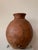 About Old tinaja of Calanda (Teruel), Spain. Made of red clay with handcrafted semi circular figures. A "tinaja" is an...