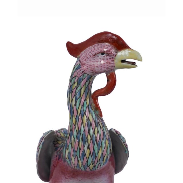 Absolutely stunning Chinese Export Famille Rose Porcelain Phoenix (Fenghuang) standing 10 inches tall. Exquisite detail in...