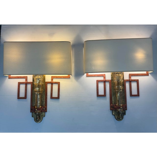Design Plus Gallery presents a Pair of Vintage Chinoiserie Wall Sconces. Each fixture displays a glass torch accented by...