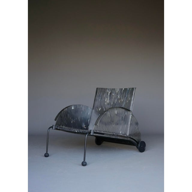 Iconic chair designed by Anna Castelli Ferrieri for Kartell in 1988. Made out of a mix of recycled plastics it pre dates a...