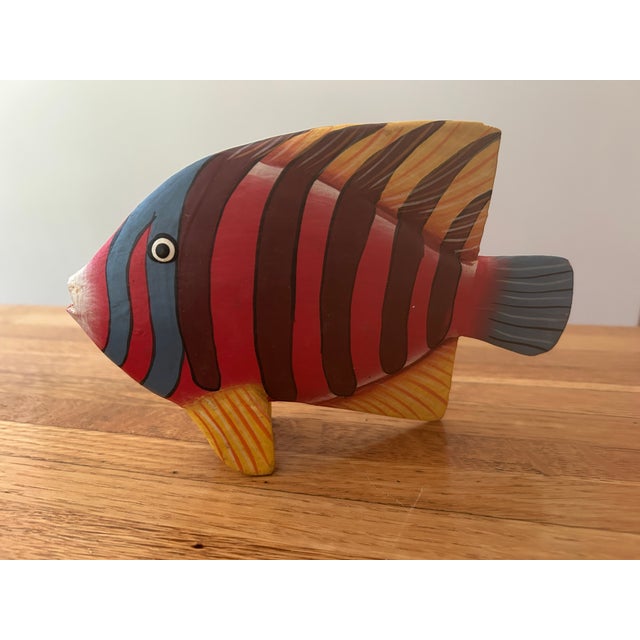 Bring the beauty and color of the ocean into your home with this charming collection of seven hand-carved and hand-painted...