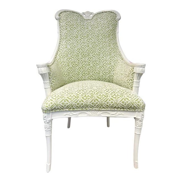 Elegant vintage bergère style accent chair featuring a beautifully carved solid wood frame finished in soft white. Newly...