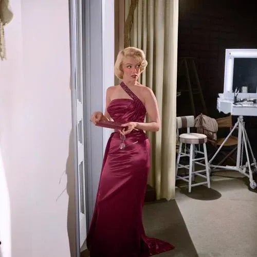 Marilyn Monroe on the Set of "How to Marry a Millionare" This lovely image features Marilyn Monroe on the set of "How to...